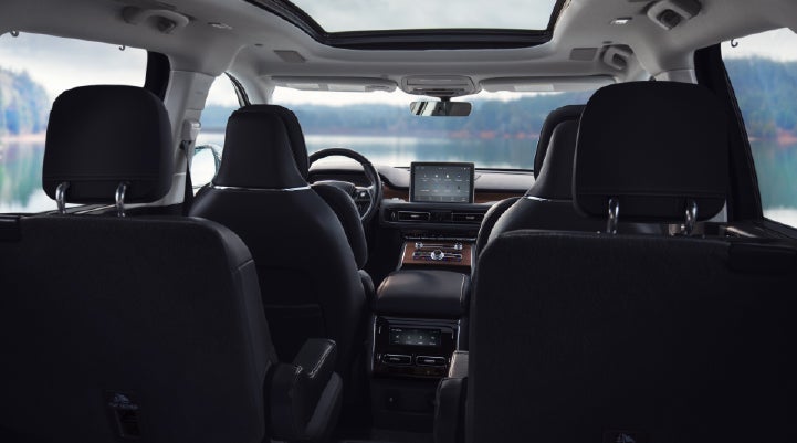 The interior of a 2024 Lincoln Aviator® SUV from behind the second row | Wallace Lincoln in Fort Pierce FL