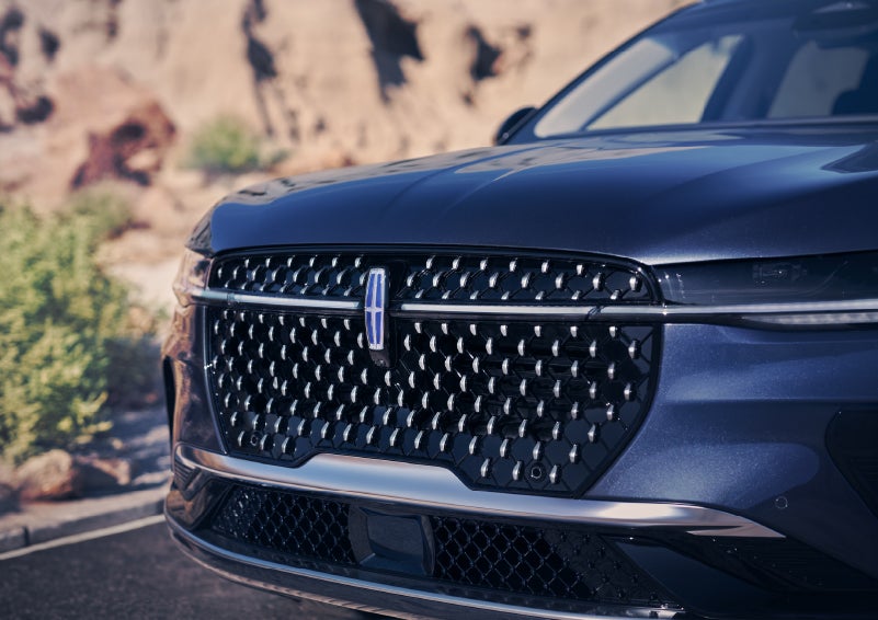 The stylish grille of a 2024 Lincoln Nautilus® SUV sparkles in the sunlight. | Wallace Lincoln in Fort Pierce FL