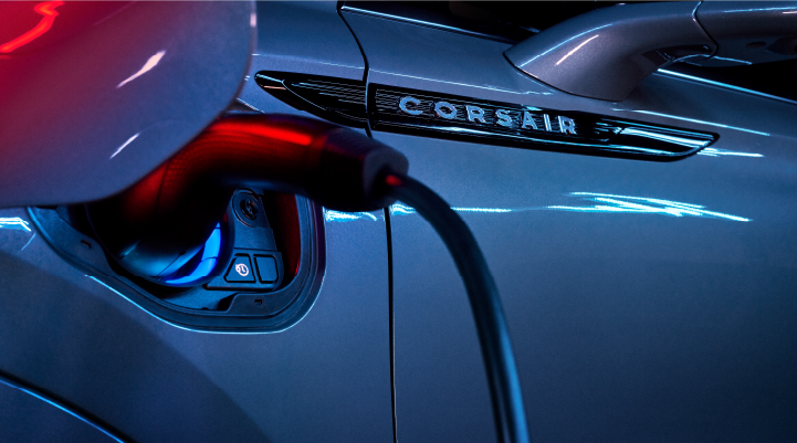 A charger plugged into the charging port of a 2025 Lincoln Corsair® Plug-in Hybrid model. | Wallace Lincoln in Fort Pierce FL