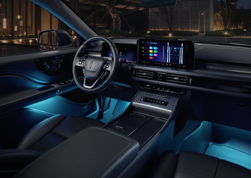Deep blue ambient lighting glows from various places within a 2026 Lincoln Aviator® SUV. | Wallace Lincoln in Fort Pierce FL