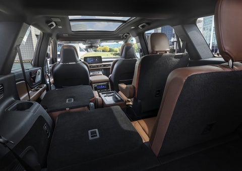 One side of the PowerFold® third-row seat and a second-row seat are folded forward in the 2026 Lincoln Aviator® SUV. | Wallace Lincoln in Fort Pierce FL