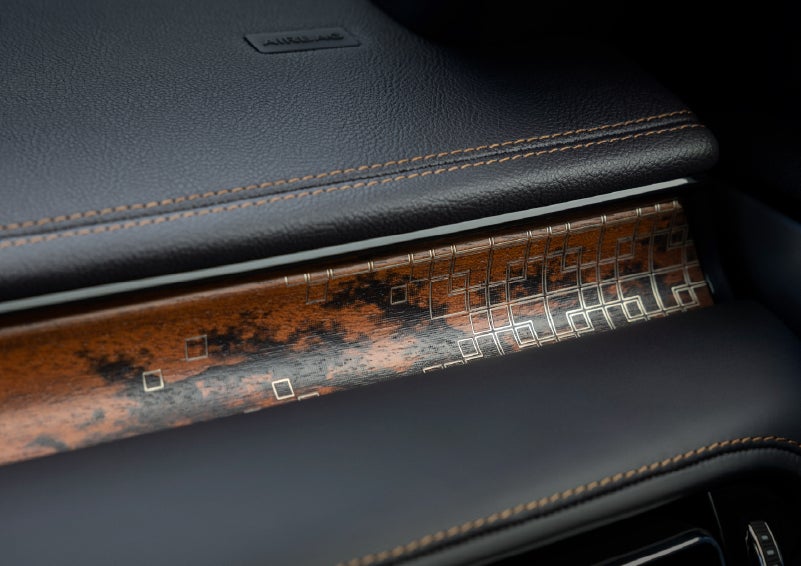 A close-up shot of the 2026 Lincoln Aviator® dashboard with unique black and brown accents and brown stitching. | Wallace Lincoln in Fort Pierce FL