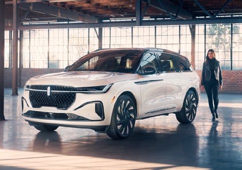 A person approaches a 2026 Lincoln Nautilus® SUV. | Wallace Lincoln in Fort Pierce FL