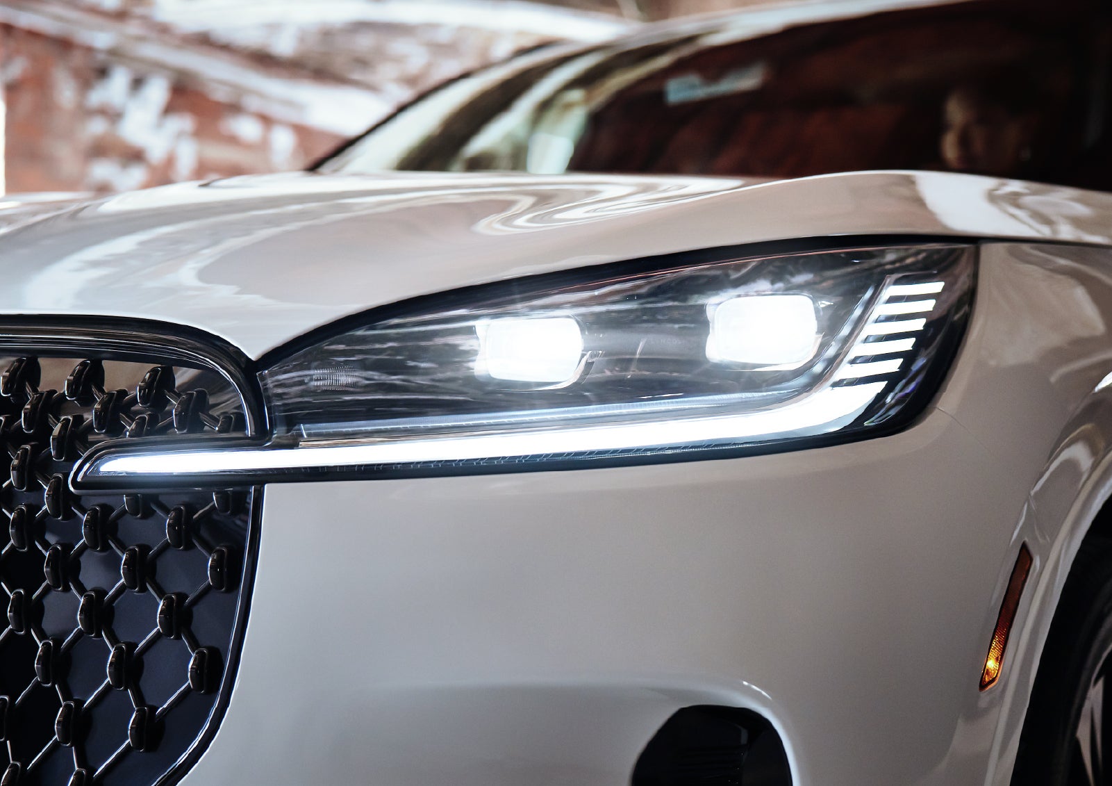 A close-up of a headlamp on the 2027 Lincoln Aviator® SUV is shown. | Wallace Lincoln in Fort Pierce FL