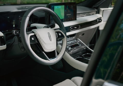The leather-trimmed steering wheel of a 2027 Lincoln Aviator® Black Label™ SUV. | Wallace Lincoln in Fort Pierce FL